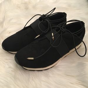Cute black sneakers with ankle lace detail